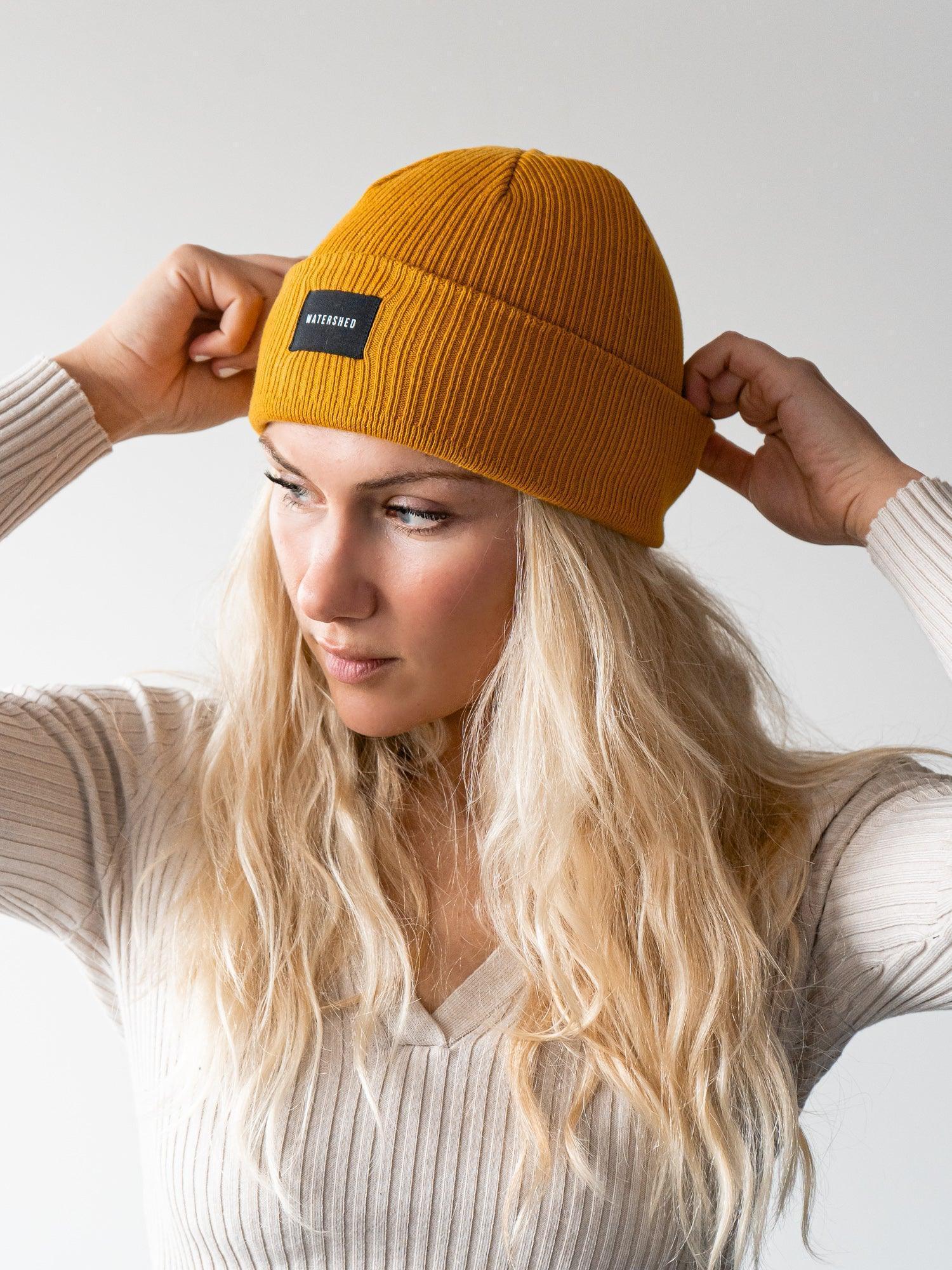 Mustard Organic Ridge Beanie - Embrace eco-friendly warmth and style with our mustard-colored organic ridge beanie, a sustainable and chic accessory for cooler days.