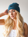Watershed Teal Beanie - Stay on-trend and comfortable with this captivating teal beanie, perfect for adding a splash of color to your winter wardrobe.