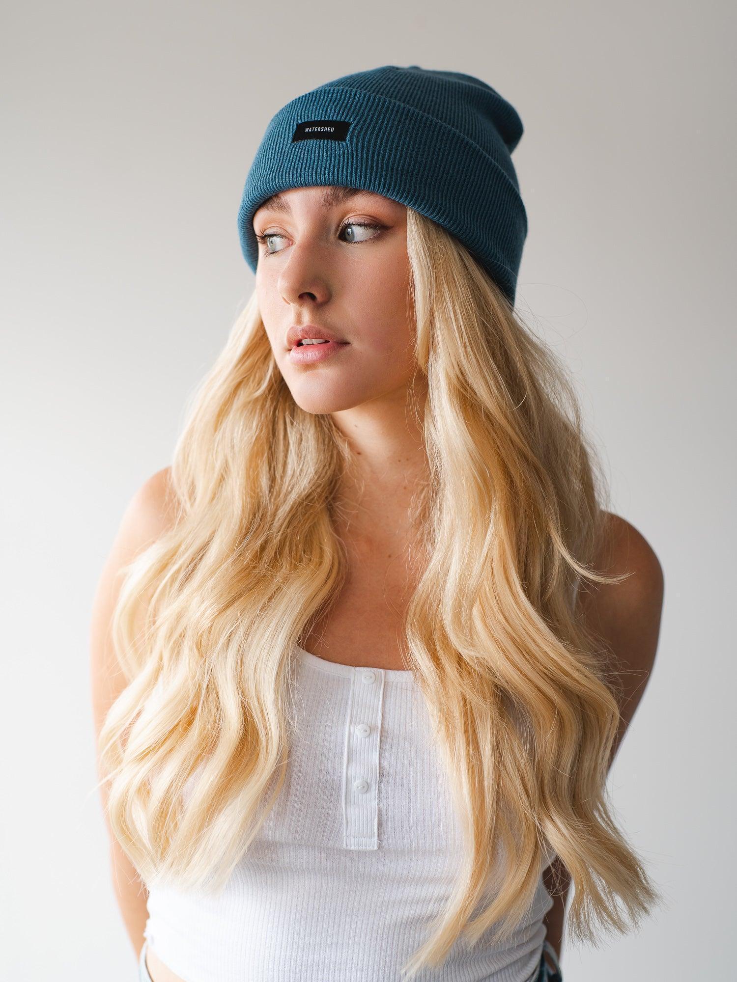 Teal Beanie - Stay cozy and chic with this trendy teal beanie, a stylish accessory to keep you warm and fashionable during the colder days.