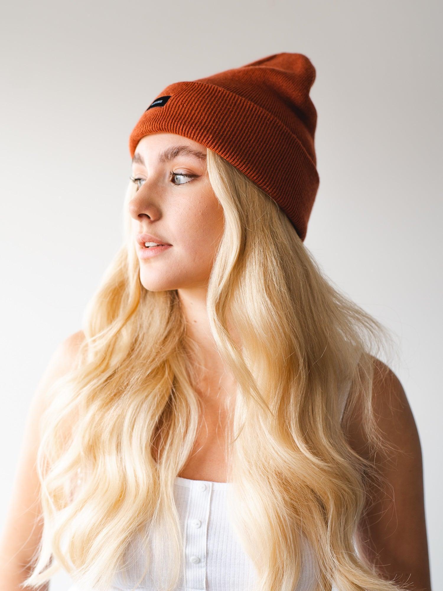 Stay warm and fashionable all winter long with our Rust Beanie, featuring a cozy and eye-catching rust color to elevate your cold-weather style