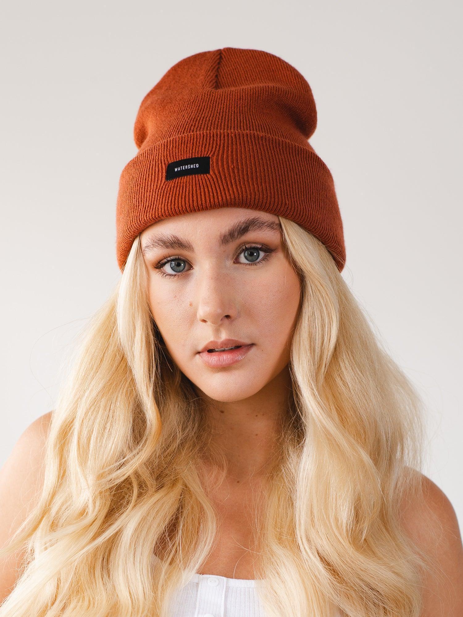Stay cozy and fashionable through the winter with our Rust Beanie, featuring a captivating rust hue and unmatched warmth.