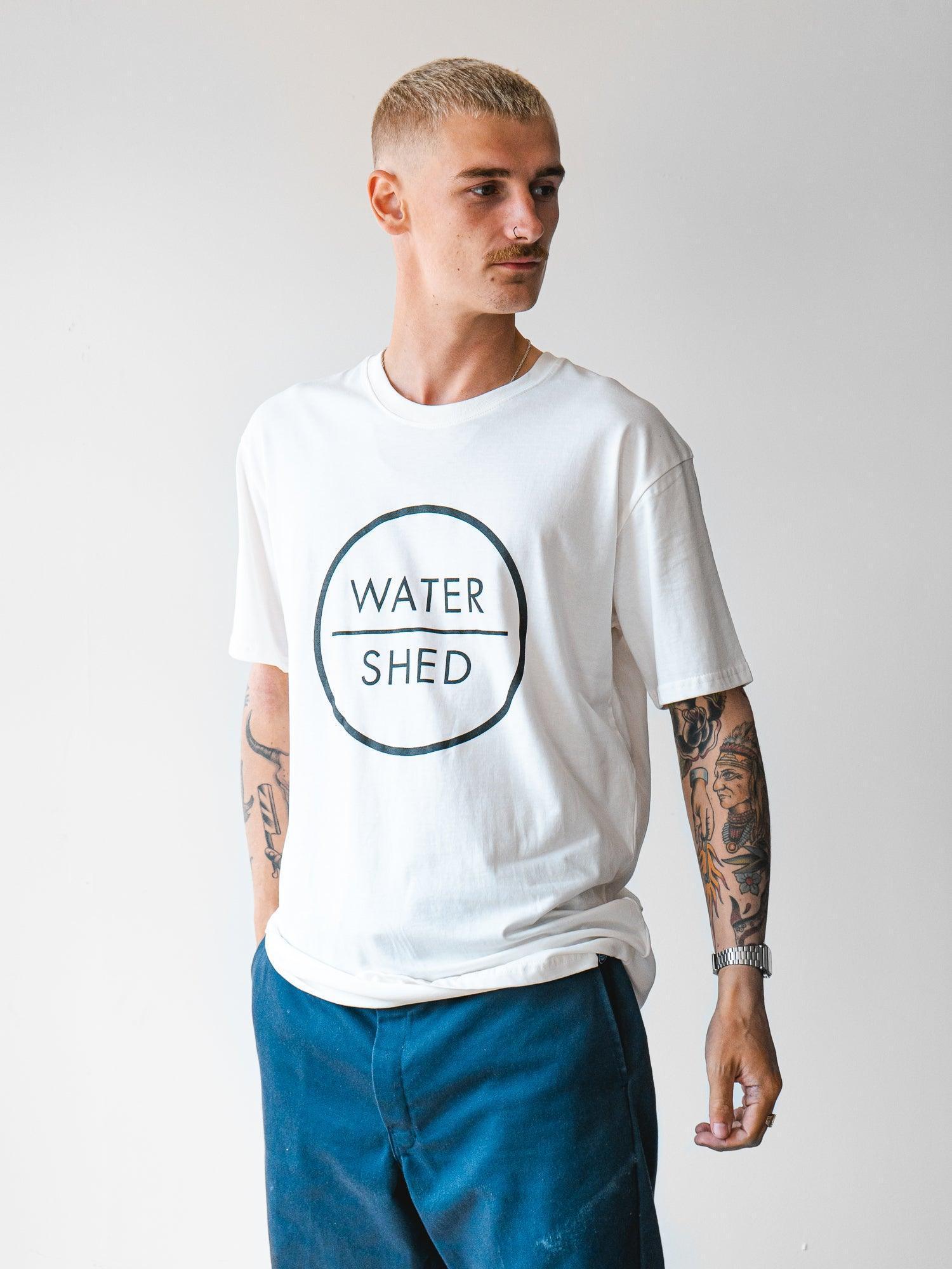 Cornish male model wearing our classic logo white surf t-shirt